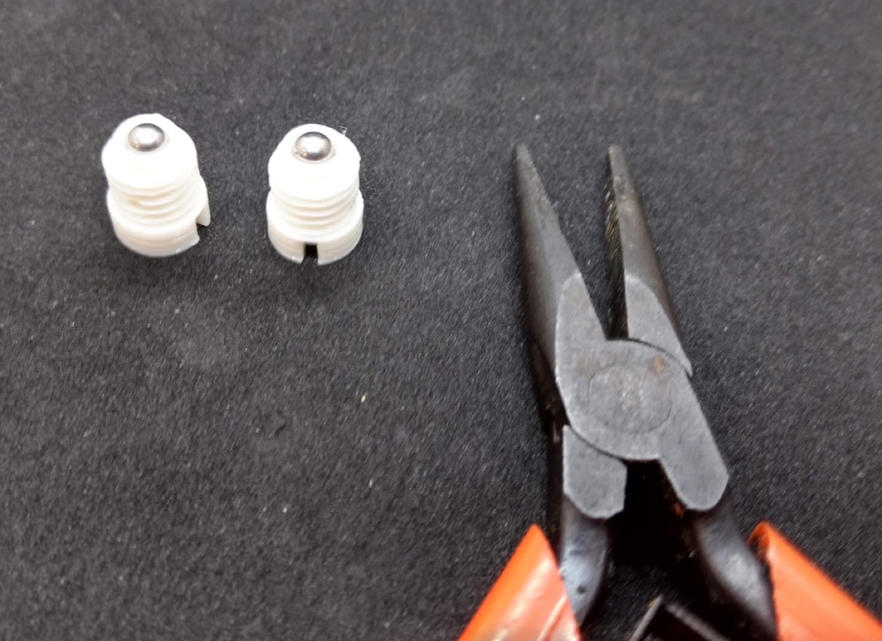 Inserting the caster ball